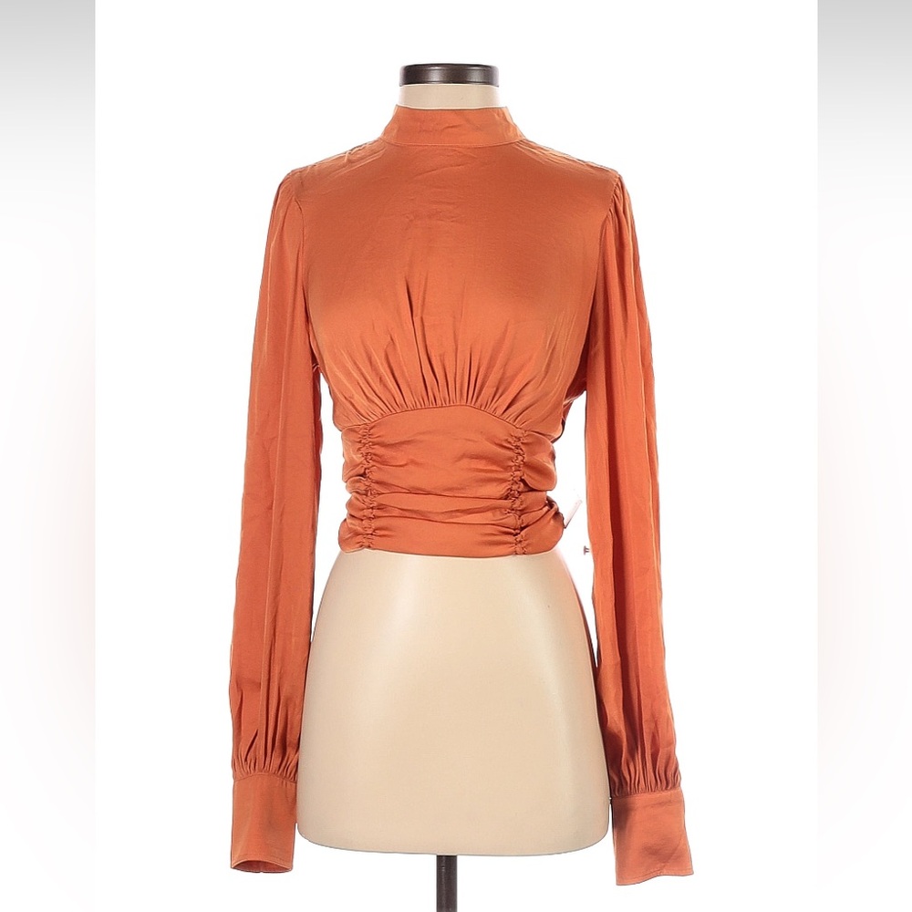 Free People orange silky high neck, open back, top size small.